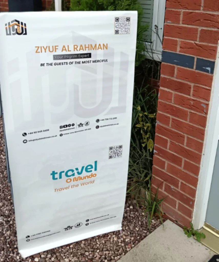 Ziyuf Al Rahman banner outside Manchester office, Travel Agent offering Umrah packages.