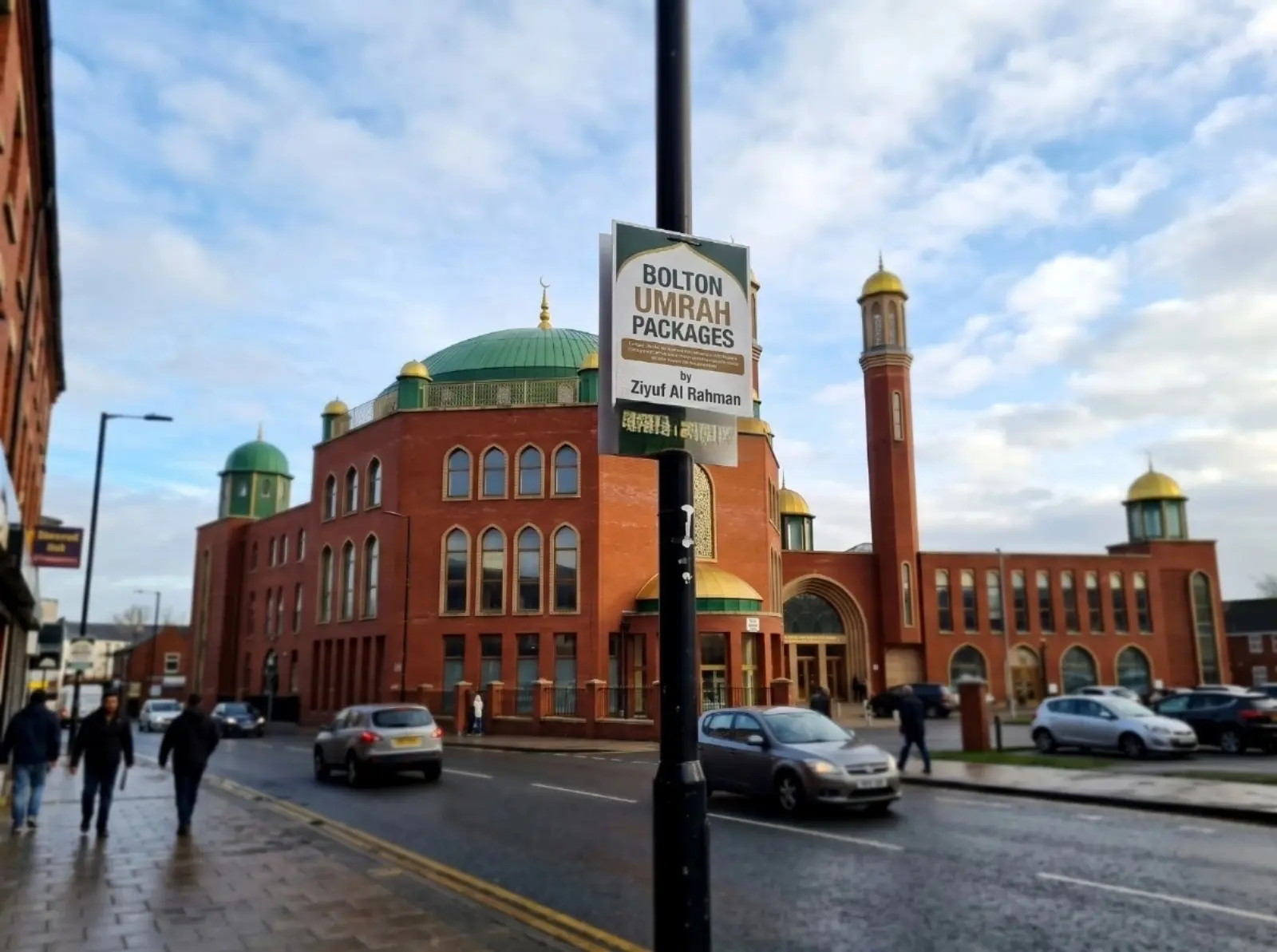 Bolton Umrah Packages - Street view of Bolton Mosque with prominent Umrah Packages advertising sign by Ziyuf Al Rahman