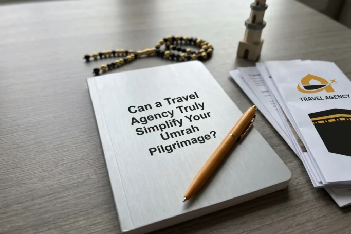 Notebook with title 'Can a Travel Agency Truly Simplify Your Umrah Pilgrimage?' surrounded by prayer beads, minaret model, and travel agency documents.